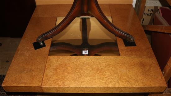A modern burrwood occasional table(-)